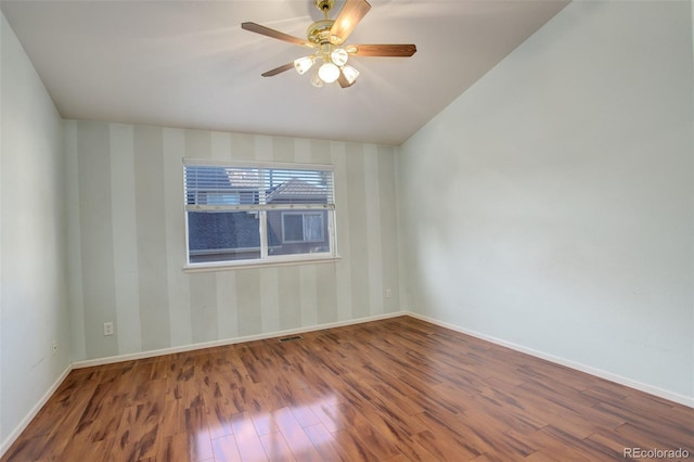 unfurnished room featuring ceiling fan and wood-type flooring