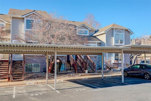 view of front of home featuring a carport