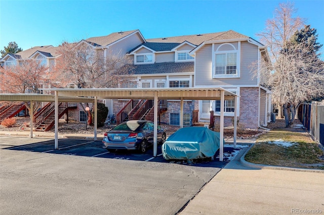 view of front of home featuring a carport