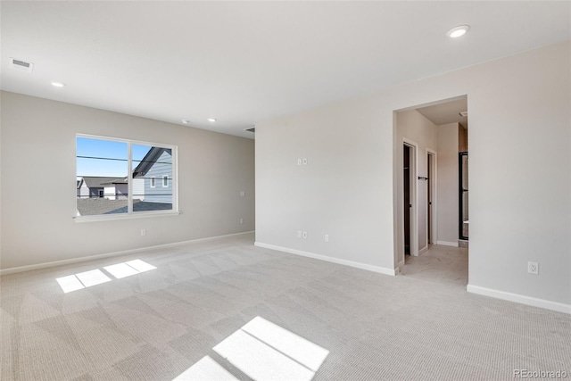 3314 N Haleyville Ct, Aurora, CO 80019 - unfurnished room featuring light colored carpet, recessed lighting, and baseboards