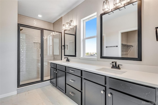 3314 N Haleyville Ct, Aurora, CO 80019 - bathroom with marble finish floors, double vanity, and a shower stall