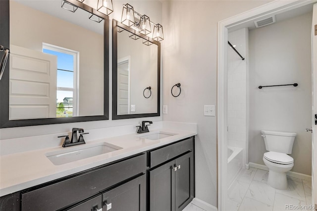 3314 N Haleyville Ct, Aurora, CO 80019 - bathroom with marble look tile flooring, baseboards, double vanity, toilet, and washtub / shower combination
