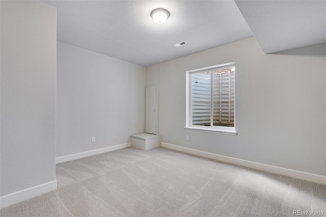 3314 N Haleyville Ct, Aurora, CO 80019 - empty room with carpet flooring, baseboards, and a textured ceiling