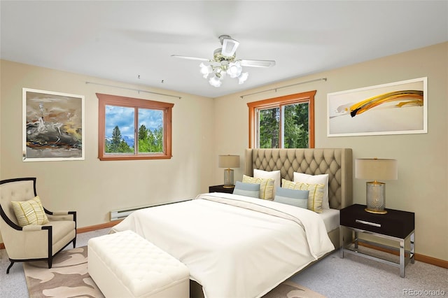 109 Cutforth Rd, Black Hawk, CO 80422 - bedroom featuring a baseboard heating unit, light colored carpet, and ceiling fan