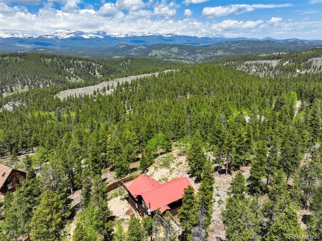 109 Cutforth Rd, Black Hawk, CO 80422 - drone / aerial view of a forest and a mountain backdrop