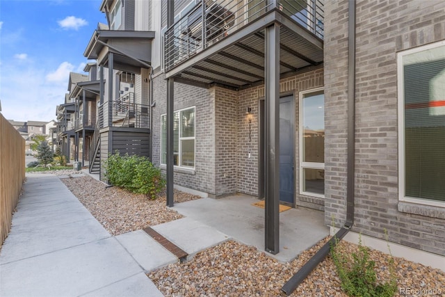 doorway to property with a balcony