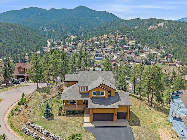 3173 Gold Yarrow Ln, Evergreen, CO 80439 - birds eye view of property featuring a residential view, a forest view, and a mountain view