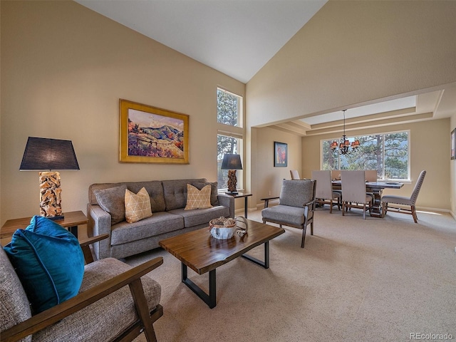 3173 Gold Yarrow Ln, Evergreen, CO 80439 - living area with baseboards, a wealth of natural light, light colored carpet, and a notable chandelier