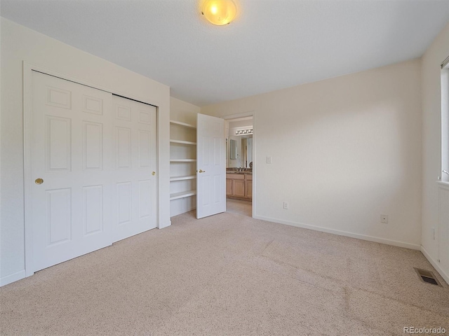 3173 Gold Yarrow Ln, Evergreen, CO 80439 - unfurnished bedroom with visible vents, baseboards, and light carpet