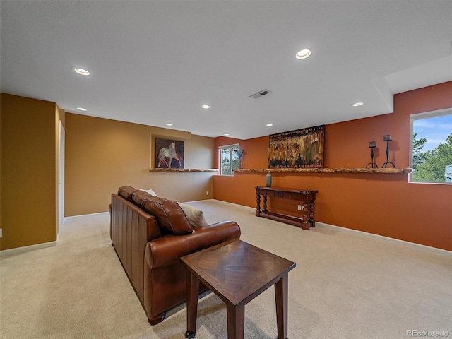 3173 Gold Yarrow Ln, Evergreen, CO 80439 - living area with light carpet, a healthy amount of sunlight, visible vents, and recessed lighting