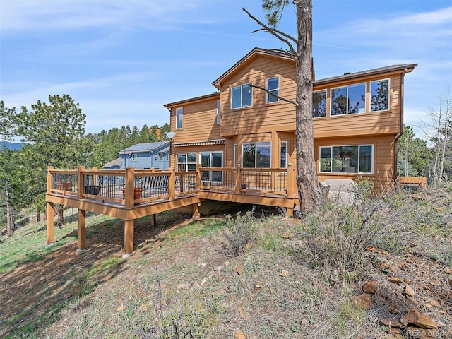 3173 Gold Yarrow Ln, Evergreen, CO 80439 - rear view of property with a deck