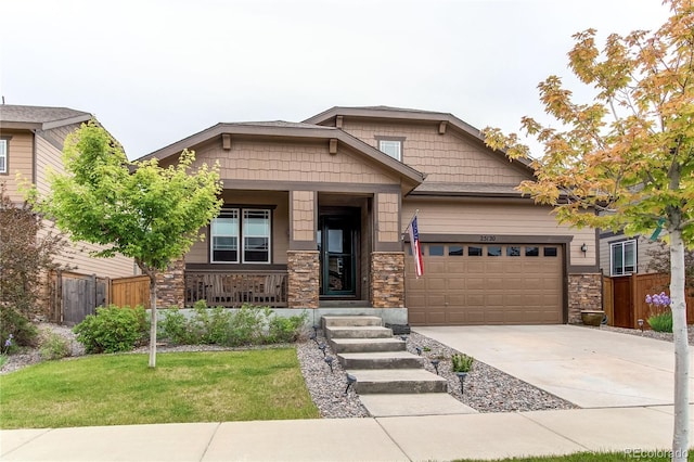 25120 E Maple Pl, Aurora, CO 80018 - craftsman inspired home with an attached garage, a porch, stone siding, and driveway