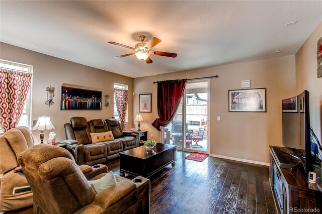 25120 E Maple Pl, Aurora, CO 80018 - living room featuring ceiling fan, plenty of natural light, dark wood-type flooring, and baseboards