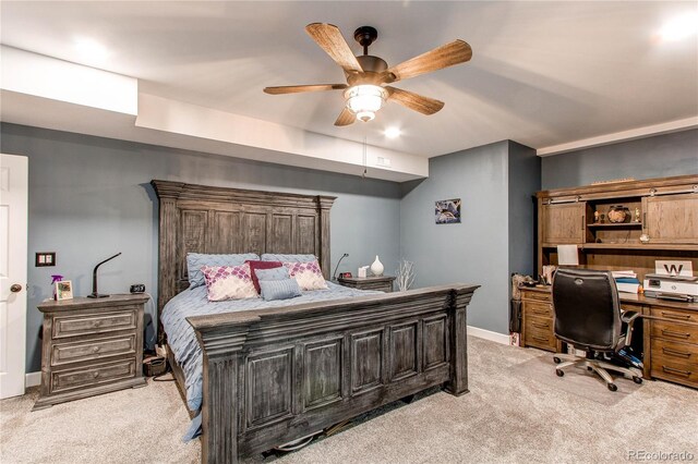 25120 E Maple Pl, Aurora, CO 80018 - bedroom with light carpet, an office area, ceiling fan, and baseboards