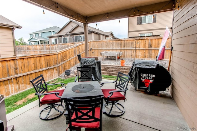 25120 E Maple Pl, Aurora, CO 80018 - fenced backyard featuring outdoor dining space, a patio area, and area for grilling