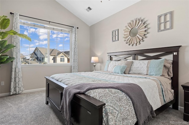 bedroom featuring lofted ceiling, carpet floors, visible vents, and multiple windows