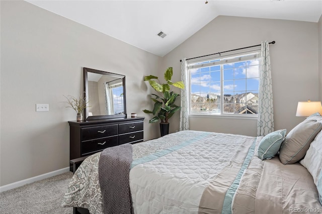 bedroom with baseboards, visible vents, carpet floors, and vaulted ceiling