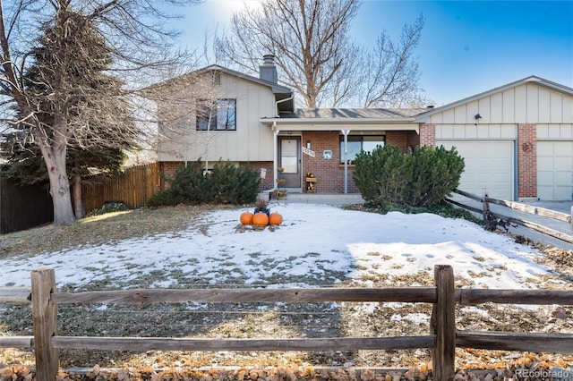 view of front of home with a garage