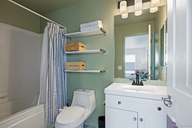 full bathroom featuring shower / bath combo with shower curtain, vanity, and toilet