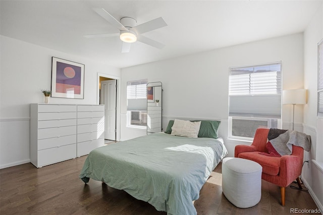 bedroom with wood finished floors and a ceiling fan