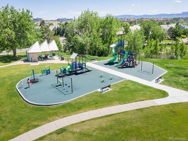 community play area with a lawn