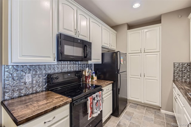 kitchen with tasteful backsplash, baseboards, white cabinets, black appliances, and recessed lighting