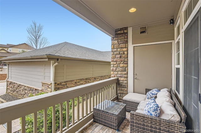 balcony with an outdoor hangout area