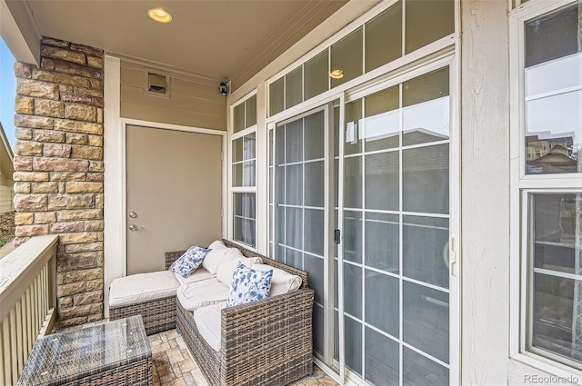 balcony featuring outdoor lounge area and covered porch