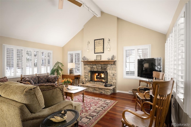 living room featuring a fireplace, ceiling fan, dark hardwood / wood-style flooring, and a healthy amount of sunlight