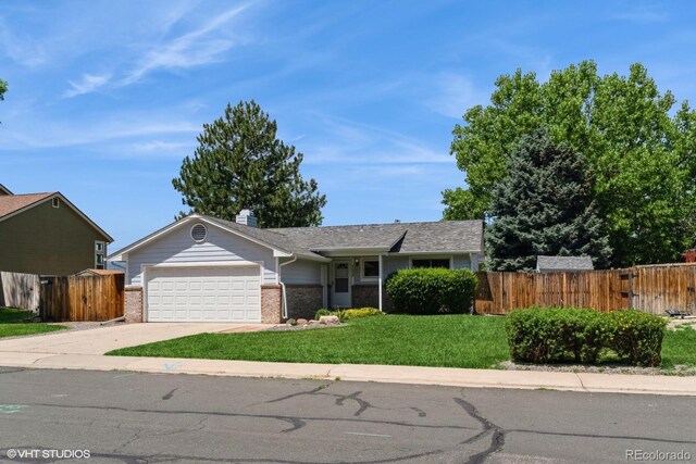 7325 S Houstoun Waring Cir, Littleton, CO 80120 - ranch-style home with brick siding, an attached garage, and concrete driveway