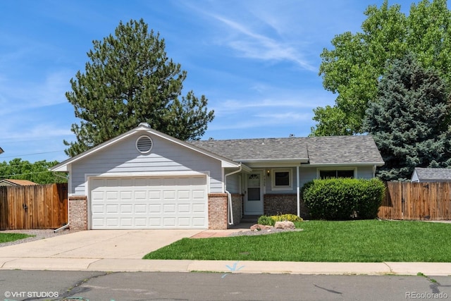 7325 S Houstoun Waring Cir, Littleton, CO 80120 - single story home featuring brick siding, an attached garage, and concrete driveway