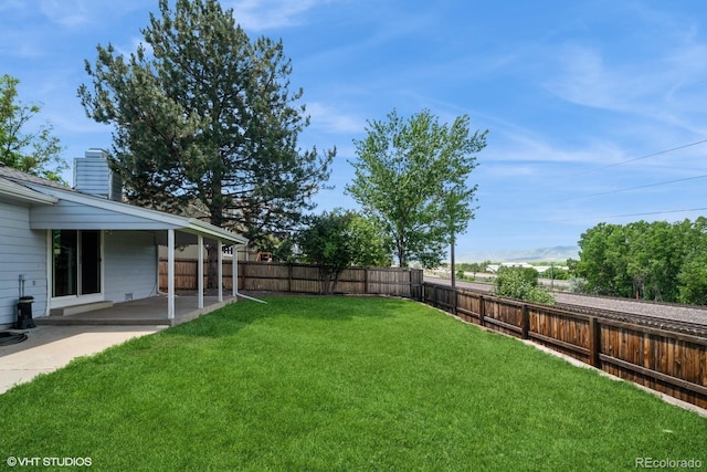 7325 S Houstoun Waring Cir, Littleton, CO 80120 - fenced backyard with a patio area