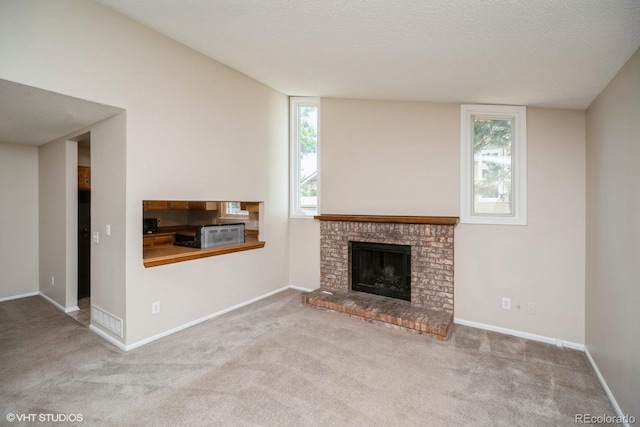 7325 S Houstoun Waring Cir, Littleton, CO 80120 - unfurnished living room with carpet and a fireplace