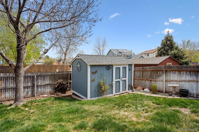 4290 Cottonwood Lakes Blvd, Thornton, CO 80241 - view of shed with a fenced backyard