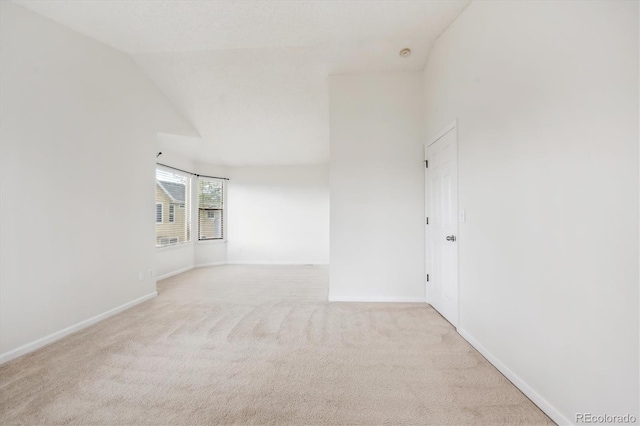 4290 Cottonwood Lakes Blvd, Thornton, CO 80241 - spare room with carpet floors, baseboards, and vaulted ceiling