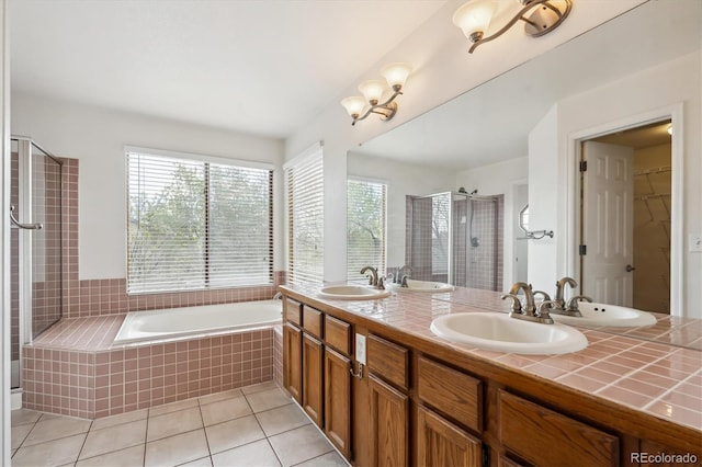 4290 Cottonwood Lakes Blvd, Thornton, CO 80241 - bathroom with tile patterned flooring, a sink, a bath, and a stall shower