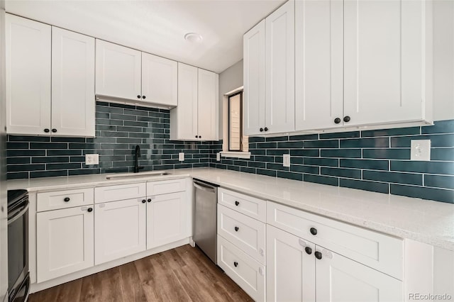 kitchen with range with electric stovetop, hardwood / wood-style floors, dishwasher, white cabinetry, and sink