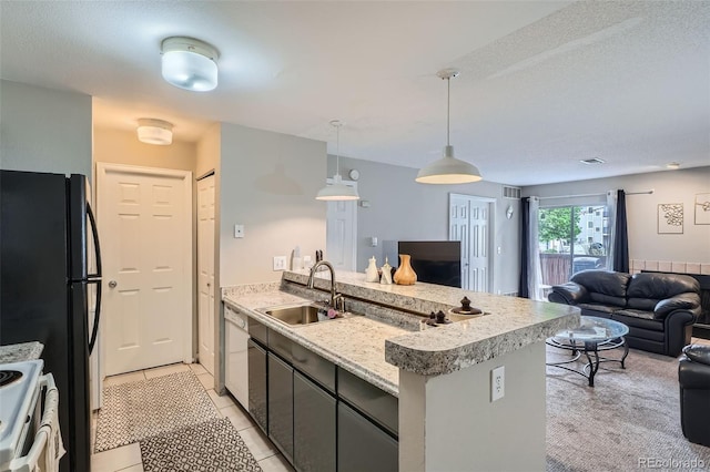 2575 S Syracuse Way Unit B107, Denver, CO 80231 - kitchen featuring white appliances, a peninsula, open floor plan, decorative light fixtures, and light tile patterned floors