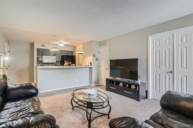2575 S Syracuse Way Unit B107, Denver, CO 80231 - living area featuring carpet flooring and a textured ceiling