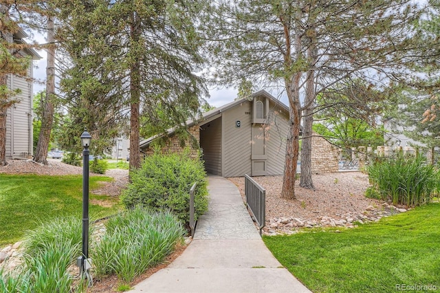 2575 S Syracuse Way Unit B107, Denver, CO 80231 - view of side of home with a yard