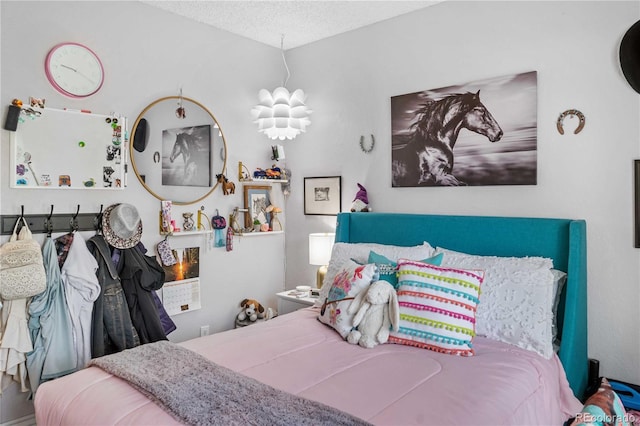 bedroom with a textured ceiling