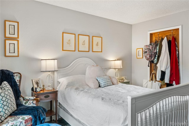 bedroom featuring a textured ceiling