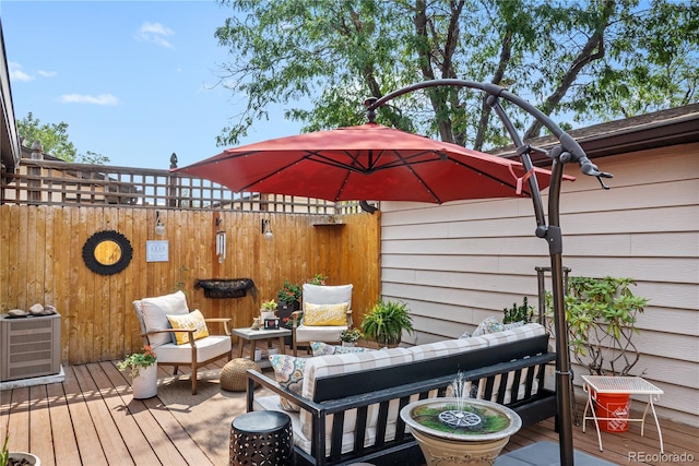 deck with an outdoor hangout area