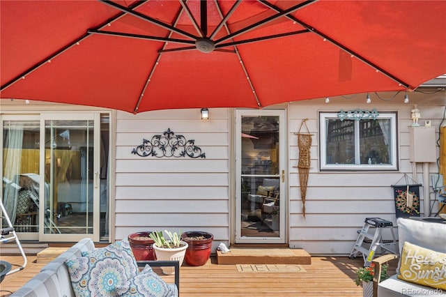 doorway to property with a wooden deck