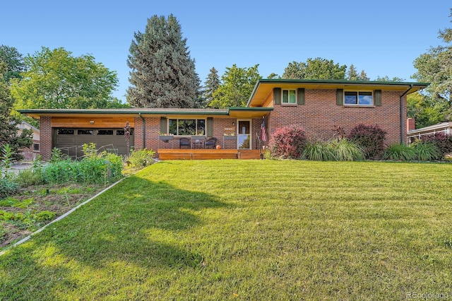 7875 W 21st Ave, Lakewood, CO 80214 - tri-level home featuring a garage, brick siding, and a front lawn