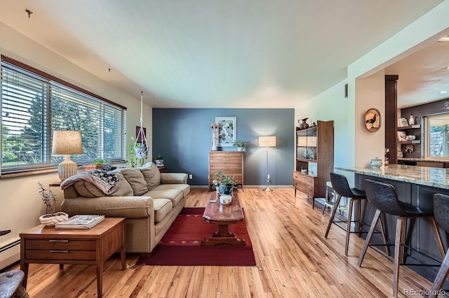 7875 W 21st Ave, Lakewood, CO 80214 - living room with wood finished floors and baseboards