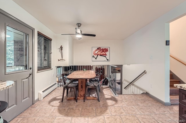 7875 W 21st Ave, Lakewood, CO 80214 - dining space featuring a baseboard radiator and ceiling fan
