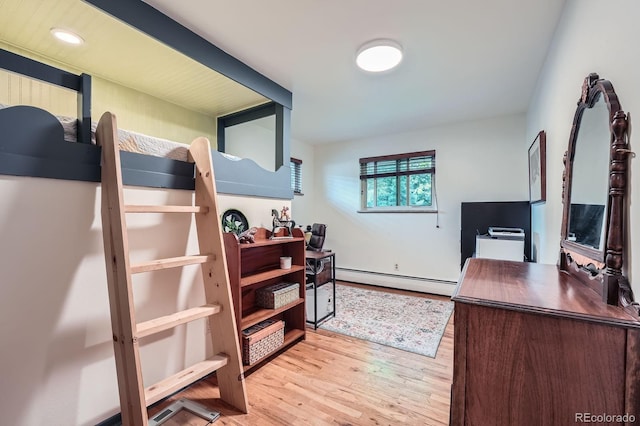 7875 W 21st Ave, Lakewood, CO 80214 - office featuring a baseboard heating unit and wood finished floors