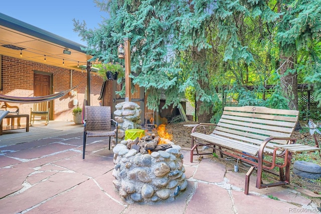 7875 W 21st Ave, Lakewood, CO 80214 - view of patio / terrace with an outdoor fire pit