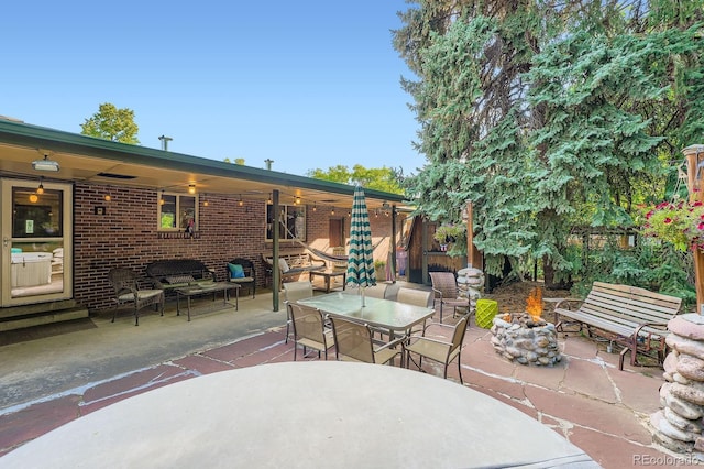 7875 W 21st Ave, Lakewood, CO 80214 - view of patio featuring a fire pit